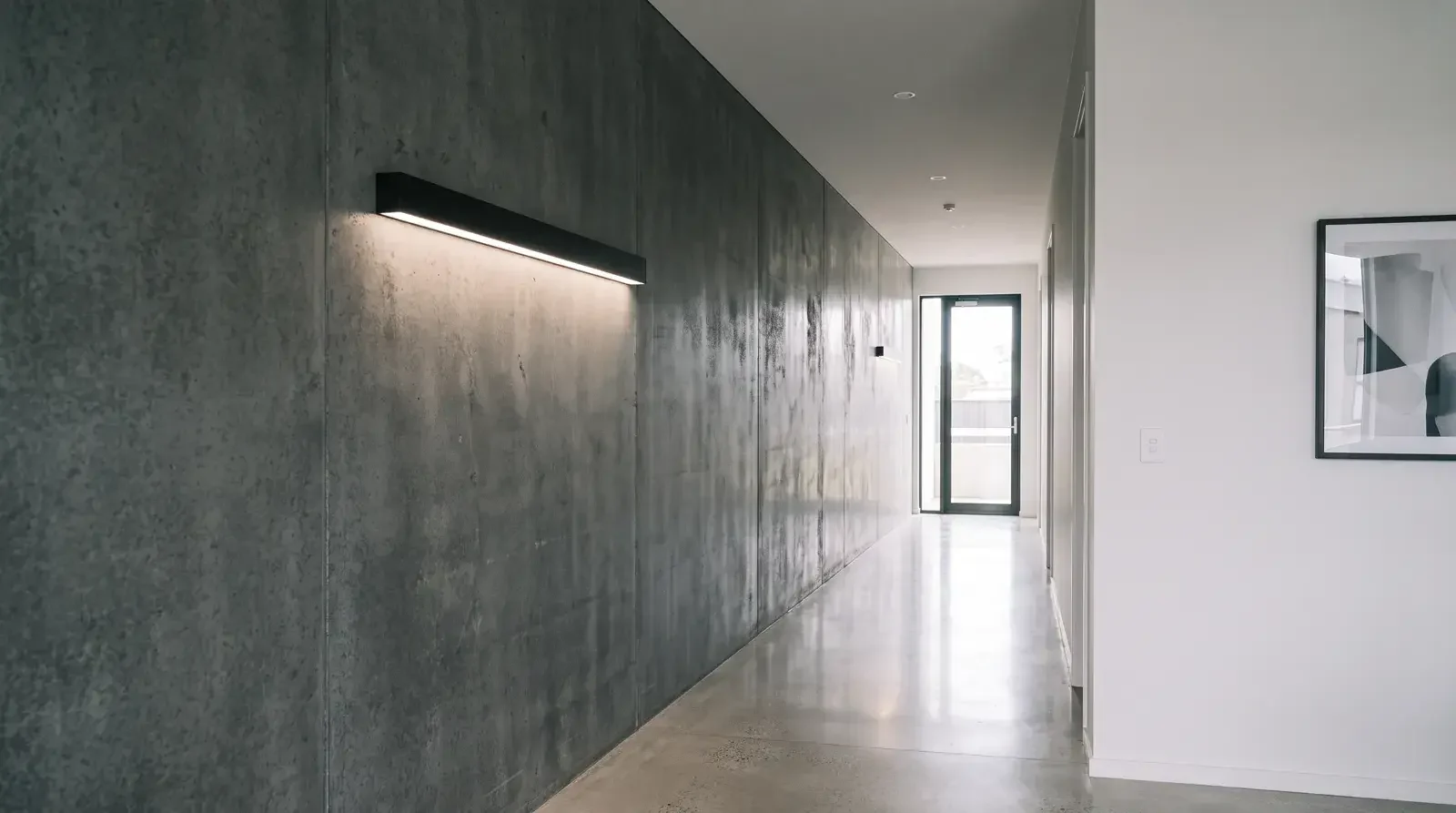 Rio wall-mounted linear LED light in a corridor