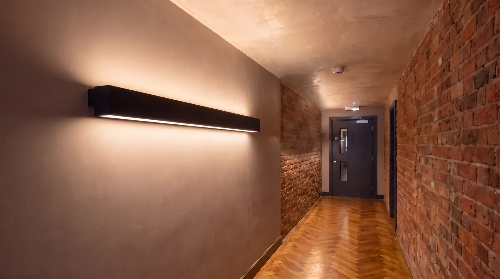 Corridor and wayfinding lighting with linear LED